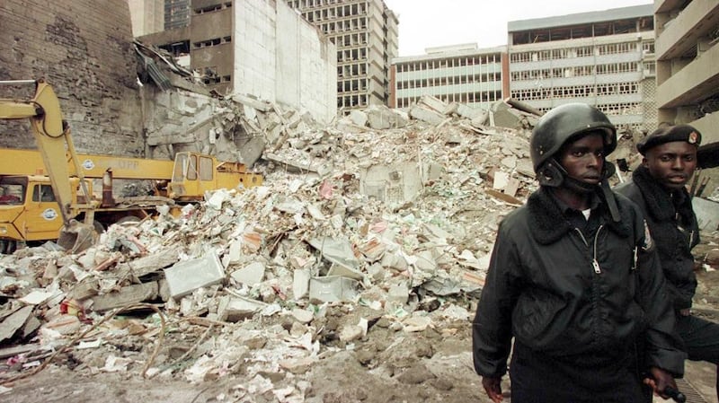 Kenyan security guards at the scene of the terror attack on the US embassy in Nairobi in August 1998, in which more than 200 were killed. Photograph: Alexander Joe/AFP via Getty Images