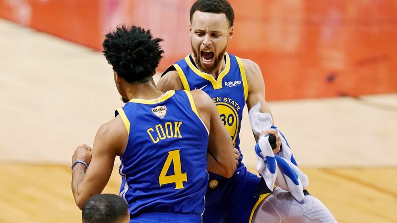 Golden State Warriors guard Stephen Curry celebrates with his team-mate Quinn Cook during a time-out in the fourth quarter against the Toronto Raptors in game two of the 2019 NBA Finals at Scotiabank Arena. Photograph: Kyle Terada/USA Today Sports