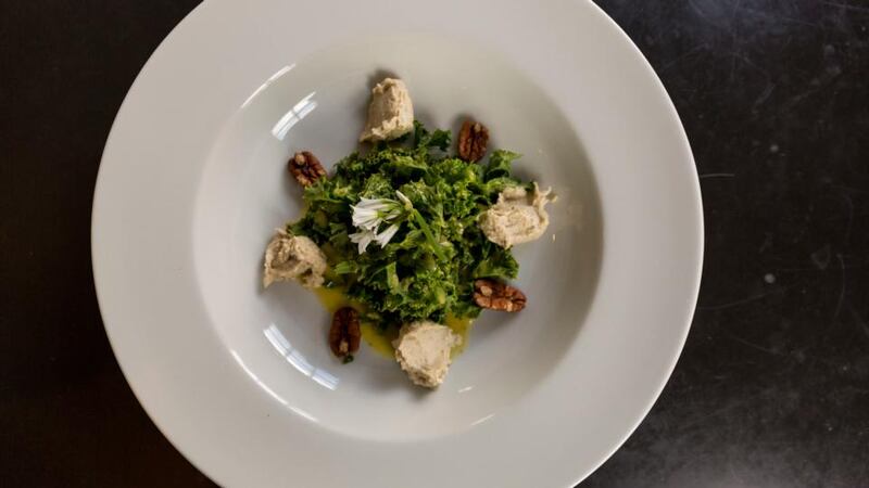 Marinated kale salad, cashew cheese, spiced pecans with a lemon and honey dressing. Photograph: Emma Jarvis