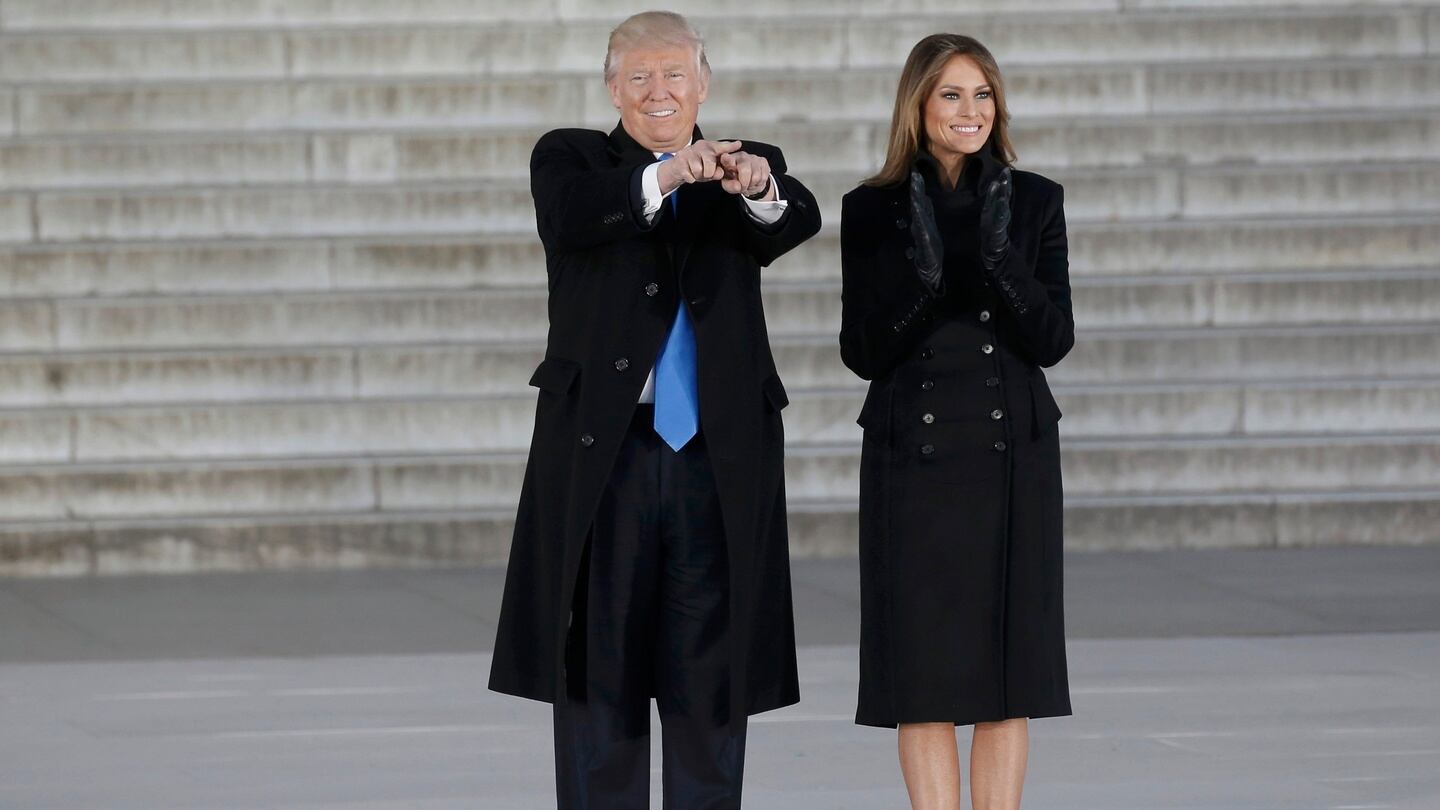 Donald Trump acknowledges supporters with his wife Melania at the “Make America Great Again! Welcome Celebration” at the Lincoln Memorial. in Washington. Photograph: Mike Segar/Reuters