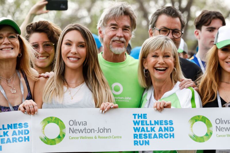 Chloe Lattanzi, John Easterling and Olivia Newton-John at the Olivia Newton-John Wellness Walk and Research Run in Melbourne in October 2019. Photograph: Sam Tabone/WireImage