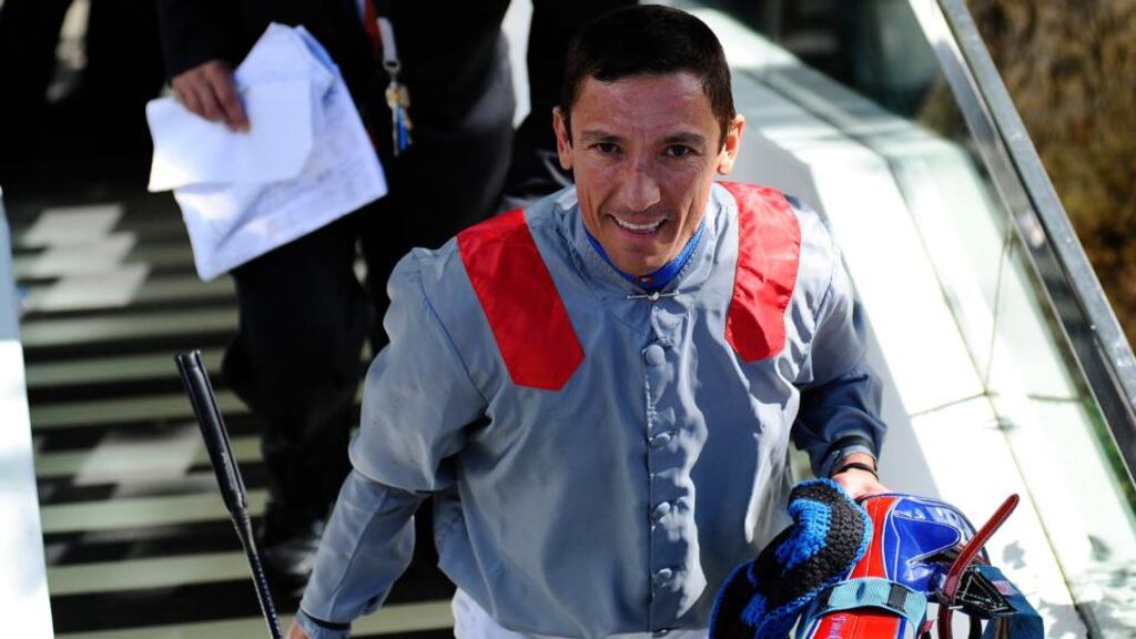 Frankie Dettori smiles after winning The Qatar Prix Vermeille at Longchamp racecourse. Photograph: Alan Crowhurst/Getty Images