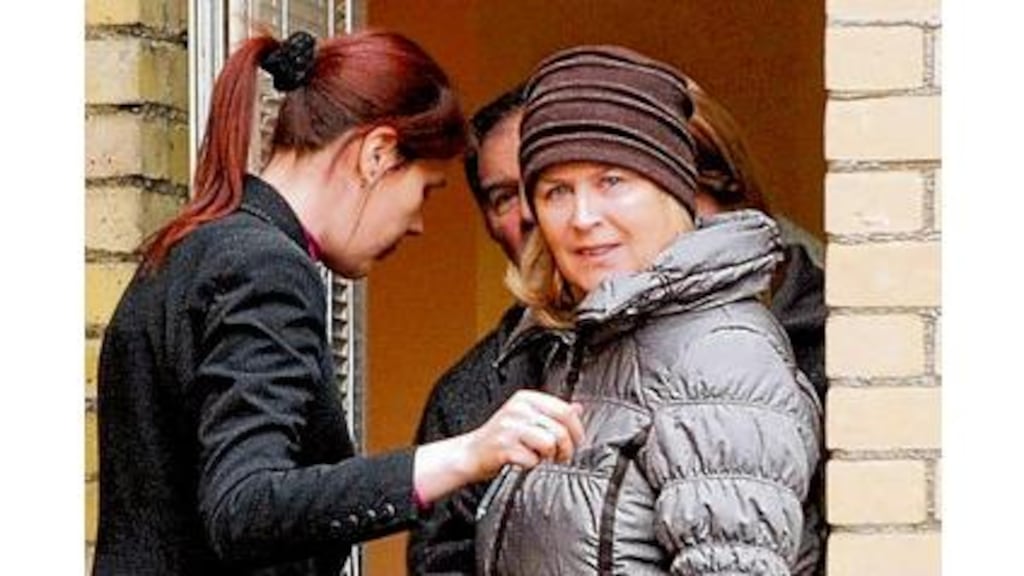 The parents of Raonaid Murray, Deirdre (right) and Jim Murray, leave Dublin Coroner's Court yesterday. An inquest jury returned a verdict of unlawful killing by a person unknown in relation to the 1999 murder of the 17-year-old. photograph: collins photos