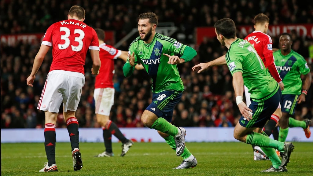 Charlie Austin wheels away after his goal on debut gave Southampton a 1-0 win away at Manchester United. Photograph: Reuters
