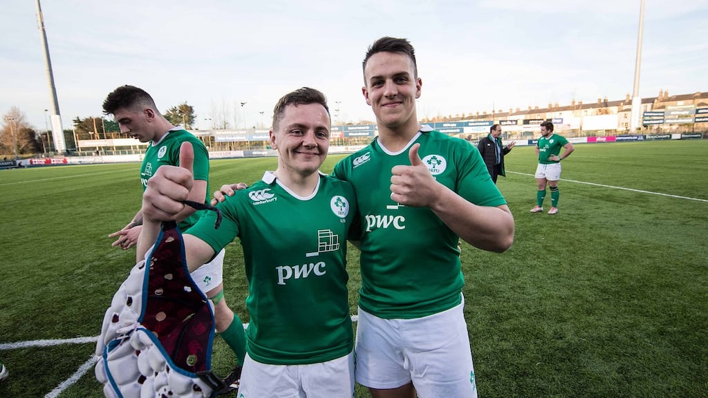 James Hume with Michael Lowry after their under-19 friendly match against Japan last March. Photograph: Inpho