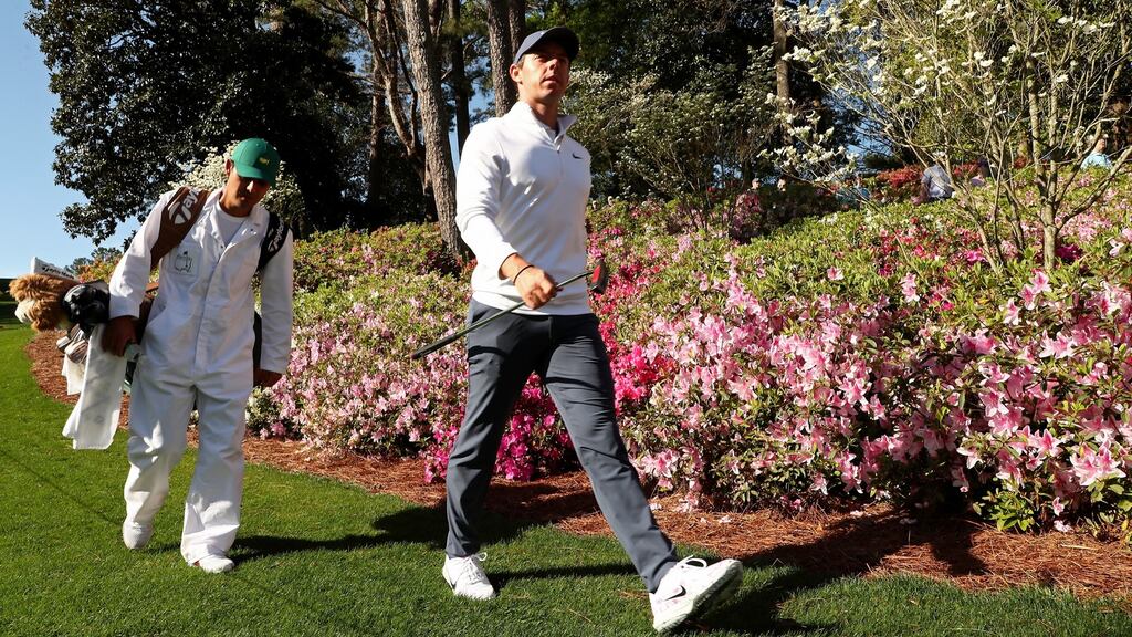 Rory McIlroy Ireland walks with caddie Harry Diamond during a practice round prior to the start of the 2018 Masters Tournament at Augusta National. Photo: Jamie Squire/Getty Images