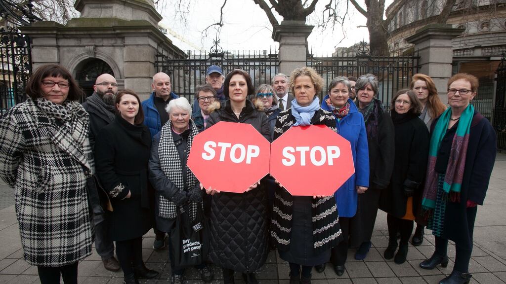 (L-R) Sarah Benson of Ruhama and Denise Charlton of the Sexual Exploitation Research Project, UCD, outside Leinster House today. Photograph: Gareth Chaney Collins