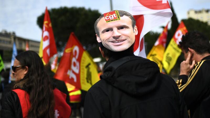 Presidential protest: a Macron mask at a demonstration by SNCF railway workers over plans to overhaul the national state-owned railway company. Photograph: Anne-Christine Poujoulat/AFP/Getty