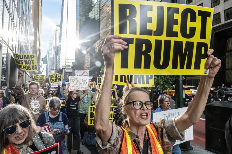 Protesters attempt to block Trump's motorcade ahead of his appearance at the UN General Assembly (Photo by Stephanie Keith/Getty Images)