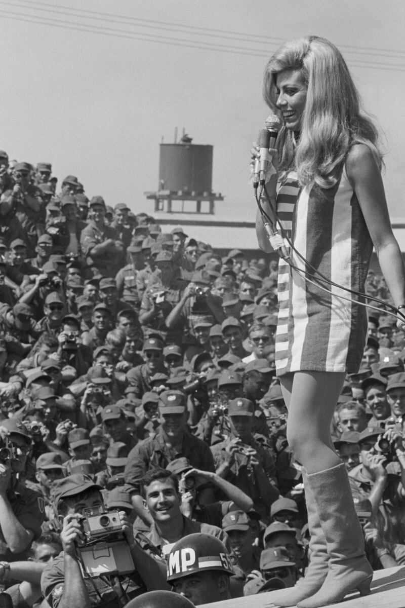 Nancy Sinatra performs for members of the First Infantry Division in Bien Hoa, South Vietnam. Photograph: Getty Images
