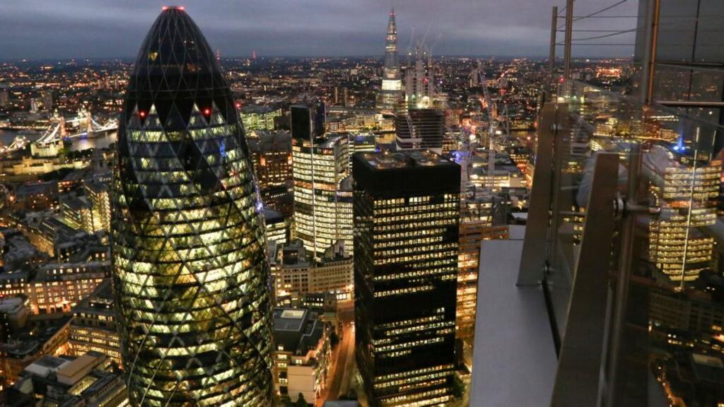 The Gherkin and St Helens stand at the heart of the City of London. Photographer: Chris Ratcliffe/Bloomberg