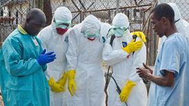 Photographs capture reality of managing Ebola in Liberia