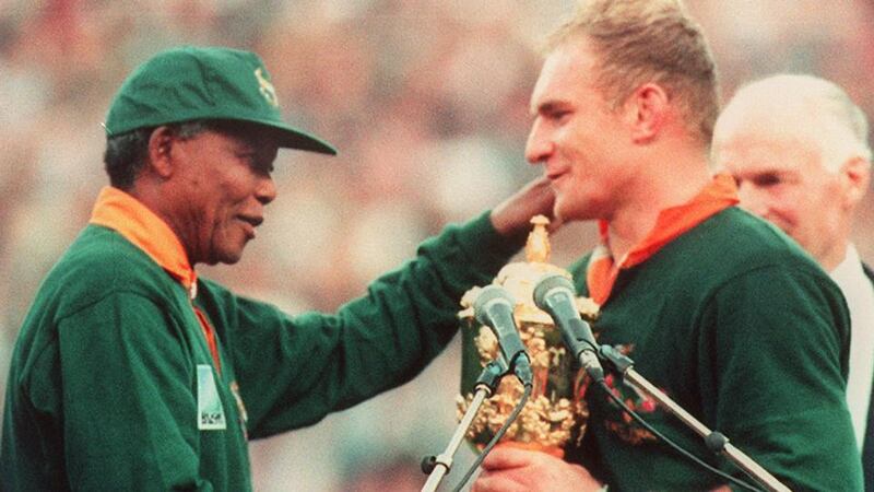 Nelson Mandela congratulates Springbok captain Francois Pienaar after South Africa's victory in the 1995 World Cup final in Johannesburg. Photograph: Getty Images