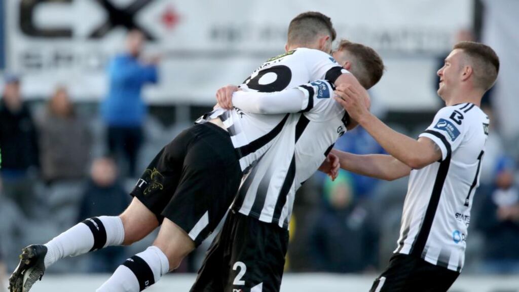 Dundalk’s Ronan Murray celebrates scoring a penalty with Sean Gannon and Patrick McEleney during their FAI Cup win over Limerick. Photo: Bryan Keane/Inpho