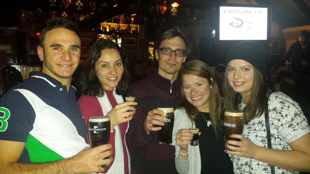 Laura Bach (centre right) and her husband (centre) in Dublin. Photograph: Laura Bach