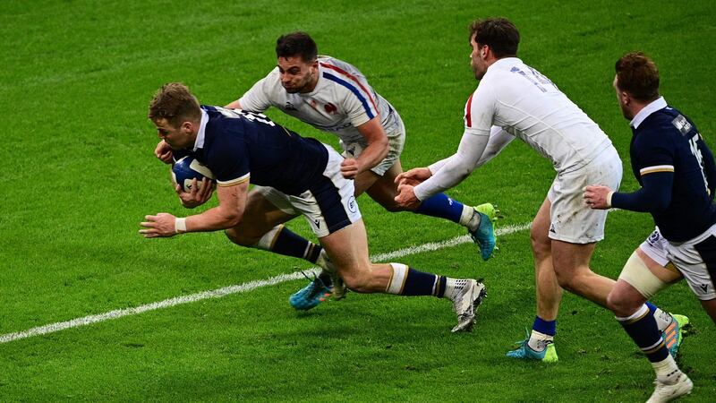 Scotland’s wing Duhan van der Merwe scores the late winning try in Paris. Photograph: Martin Bureau/Getty/AFP