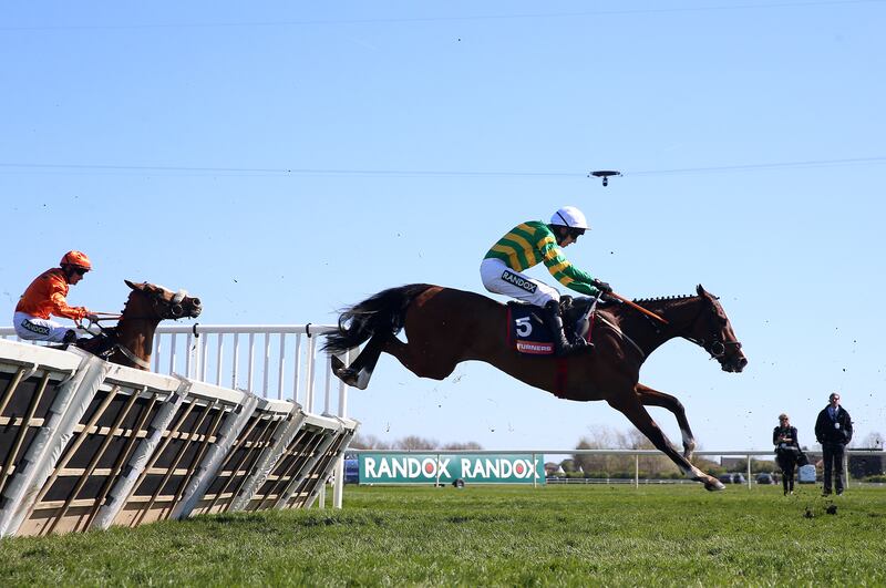 Honesty Policy ridden by Mark Walsh on their way to winning the Turners Mersey Novices' Hurdle at Aintree on Saturday. Photograph: Nigel French for The Jockey Club/PA Wire