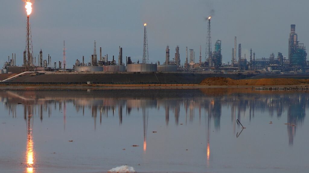 An oil refinery in Venezuela. Opec would like a deal to limit output. Photograph: Carlos Garcia Rawlins/Reuters