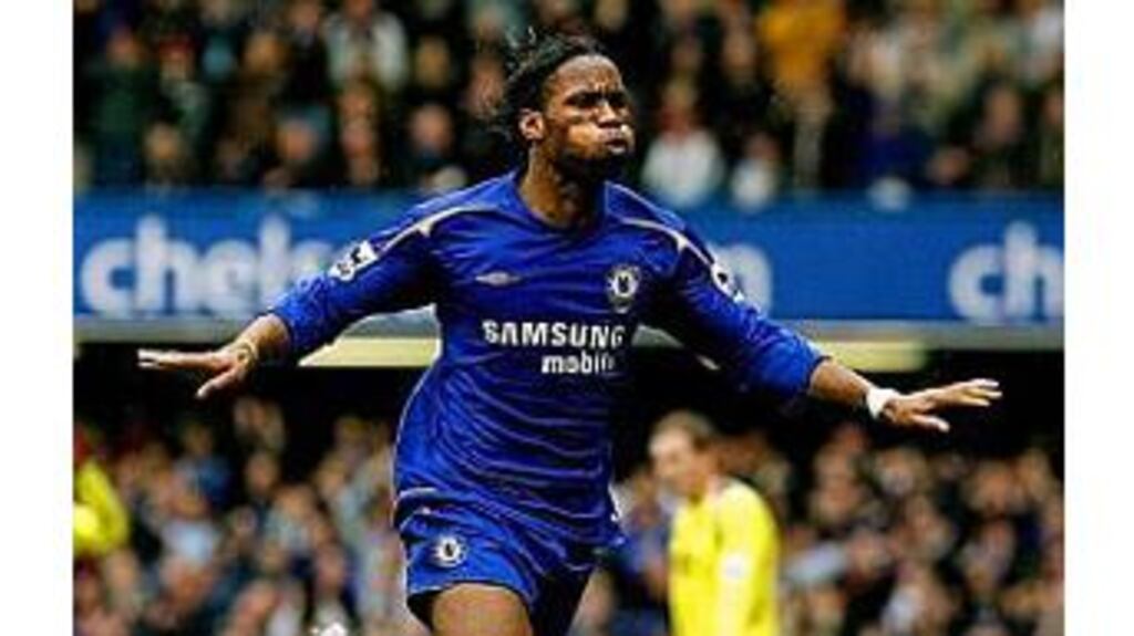 Didier Drogba celebrates after his controversial goal was allowed to stand