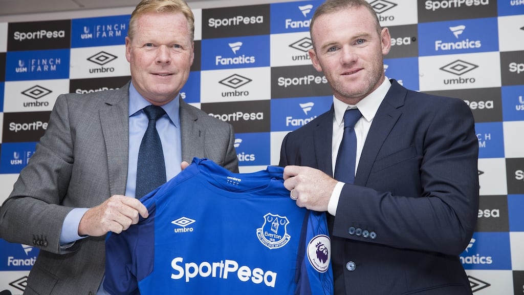Everton boss Ronald Koeman with the returning Wayne Rooney. Photograph: Mark Robinson/Getty