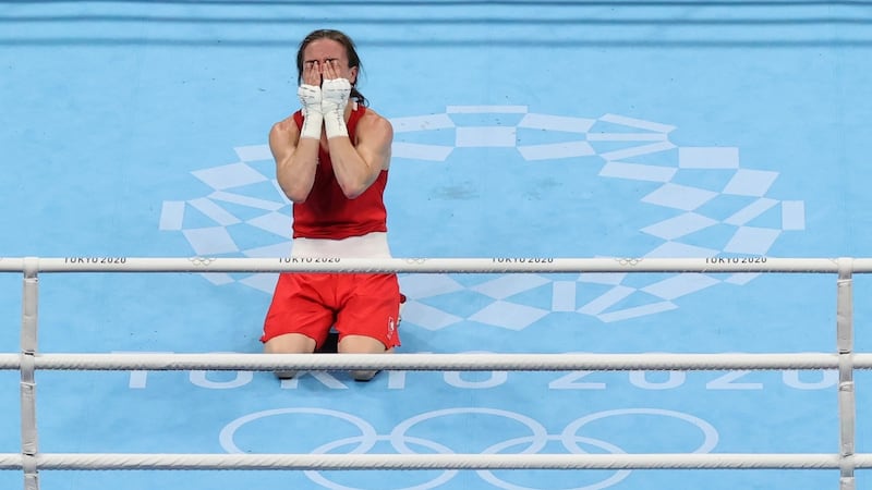 Kellie Harrington sinks to her knees after hearing the judges’ verdict and winning gold in the women’s lightweight against Brazil’s Beatriz Ferreira at the Kokugikan Arena in Tokyo. Photograph: Julian Finney/Getty Images