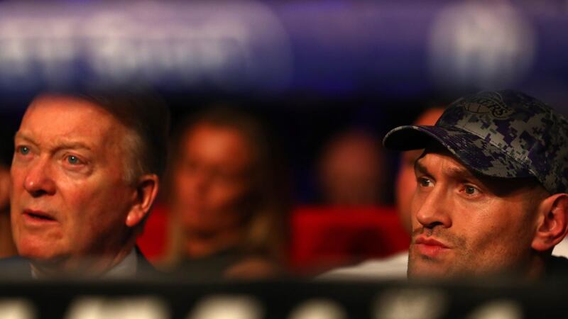 Tyson Fury with his promoter Frank Warren. Fury is set to fight unbeaten German Tom Schwarz in June. Photograph: Matthew Lewis/Getty