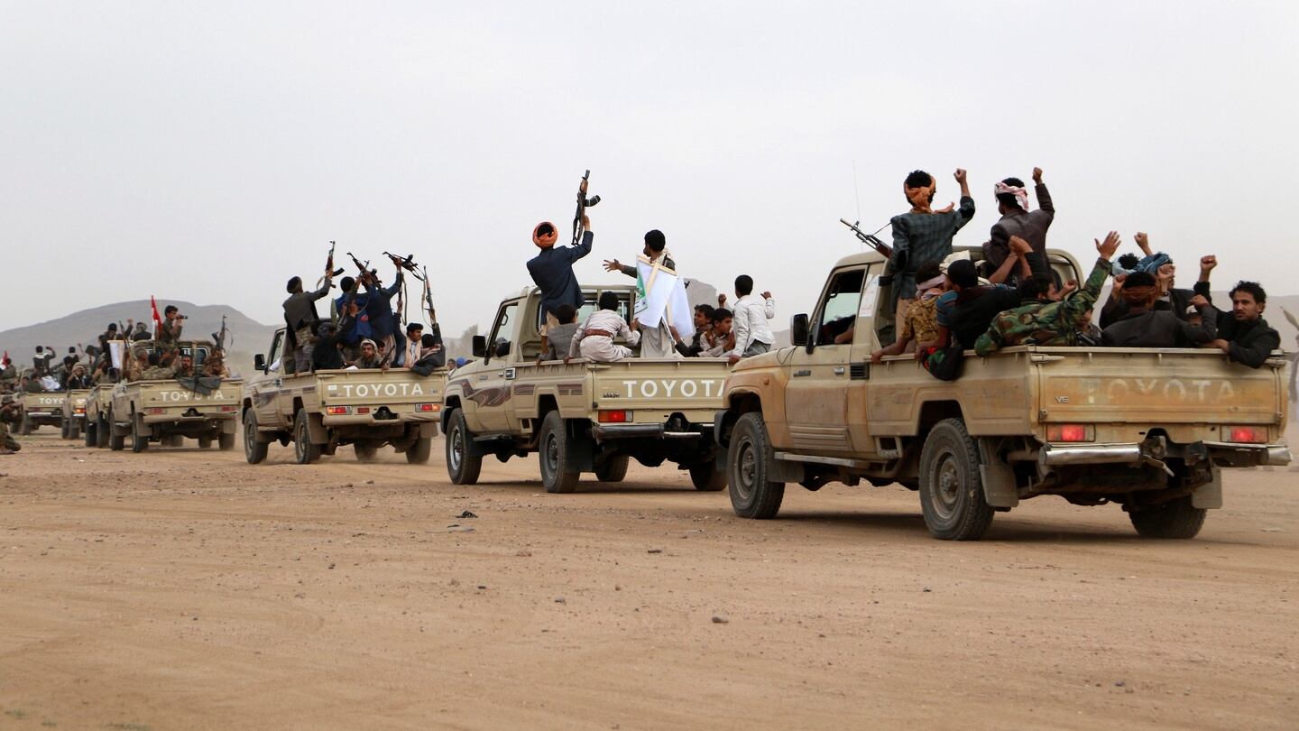 Houthi fighters ride on the back of trucks as they parade in the northwestern city of Sa’ada, Yemen, on August 23rd. Photograph: Naif Rahma/Reuters