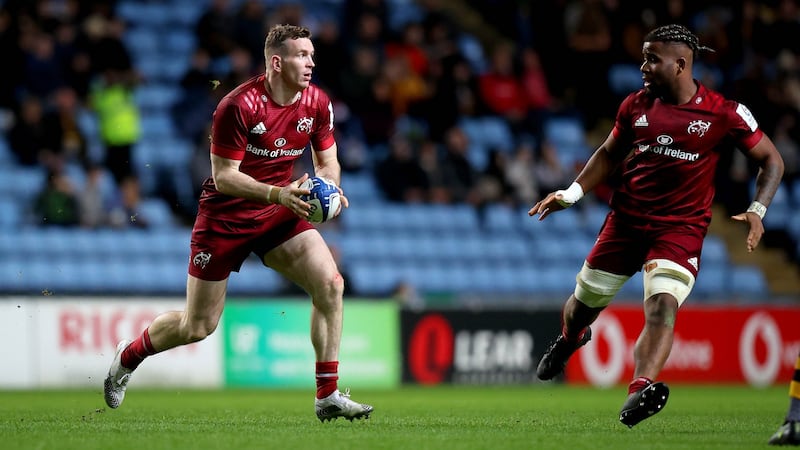 Farrell, here with Daniel Okeke, was one of the few experienced heads Munster had for their famous win away to Wasps. Photograph: Ryan Byrne/Inpho