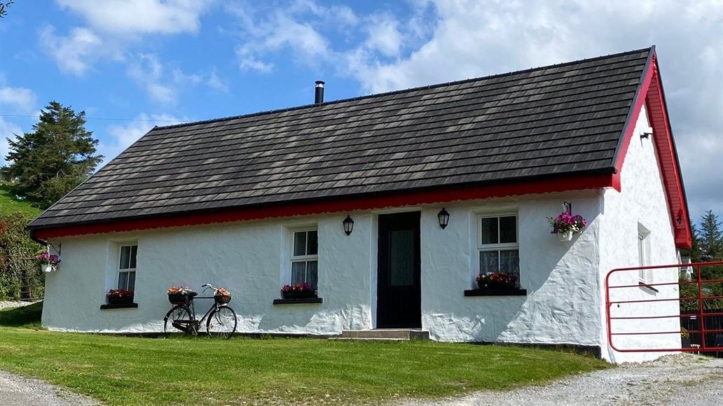 This two-bedroom farmhouse comes to the market in turnkey condition