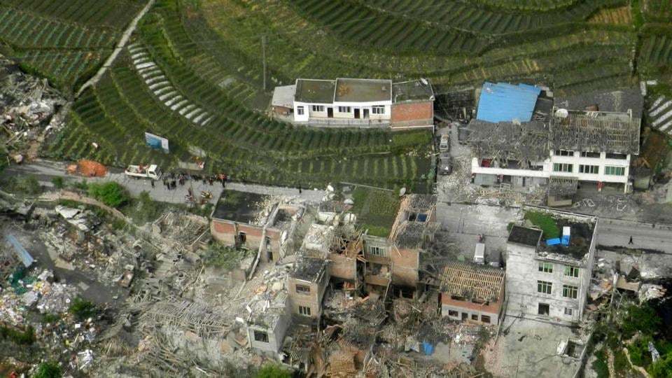 An aerial view shows houses damaged after a strong earthquake in Lushan county, Ya'an, Sichuan province. Photograph: China Daily/Reuters