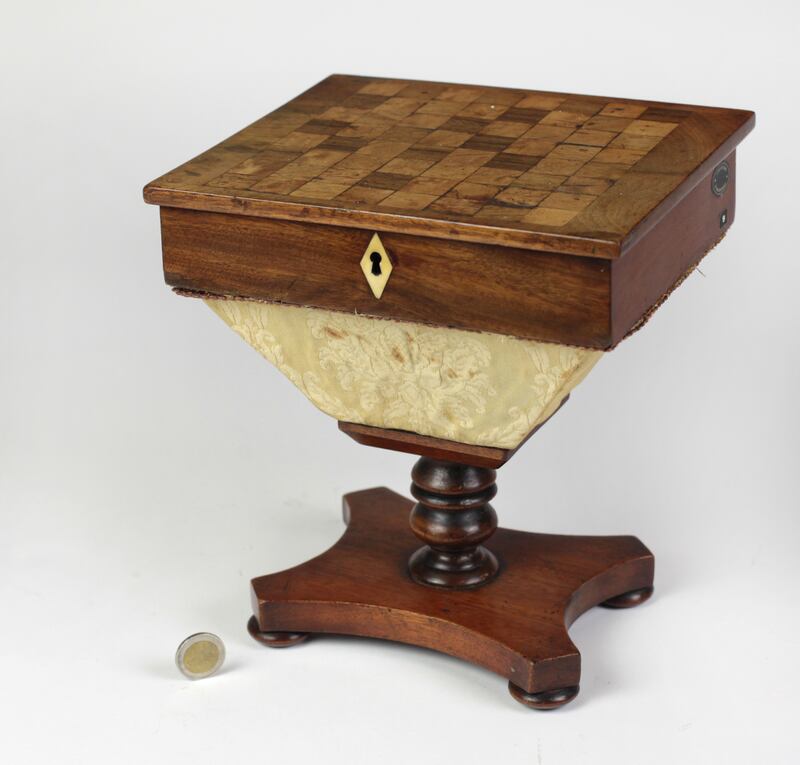 Lot 446: A William IV mahogany miniature apprentice made combinedgames’ table and workbox, 9 inches tall, €350 - €450