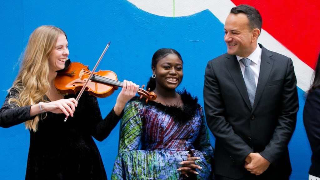 Violinist Lucia MacPartlin and Tosin Bankole with Tánaiste Leo Varadkar at the launch of the Basic Income for the Arts pilot scheme. Photograph: Gareth Chaney/Collins