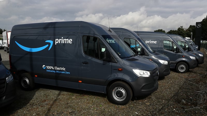 A fleet of Amazon vans on the forecourt of a Mercedes dealership in Dublin as construction continues at nearby Baldonnell Business Park on what will be Amazon’s first warehouse in the State. Photograph: Brian Lawless/PA Wire