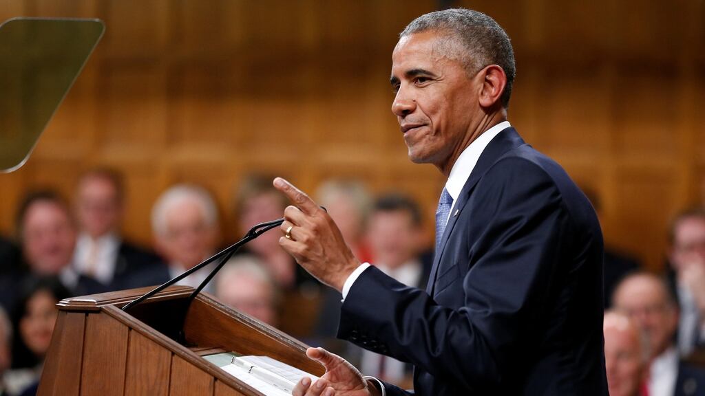 US President Barack Obama addresses Parliament in the House of Commons on Parliament Hill in Ottawa, Ontario, Canada. Photograph: Chris Wattie/Reuters