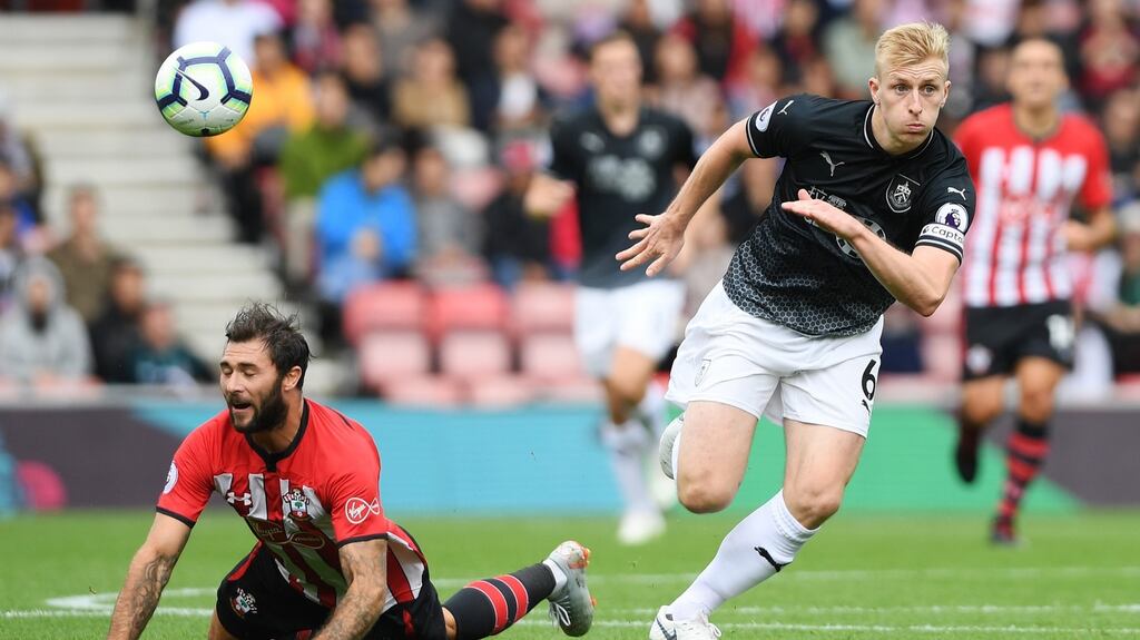Ben Mee of Burnley gets past Charlie Austin of Southampton during the Premier League clash. Photo: Mike Hewitt/Getty Images