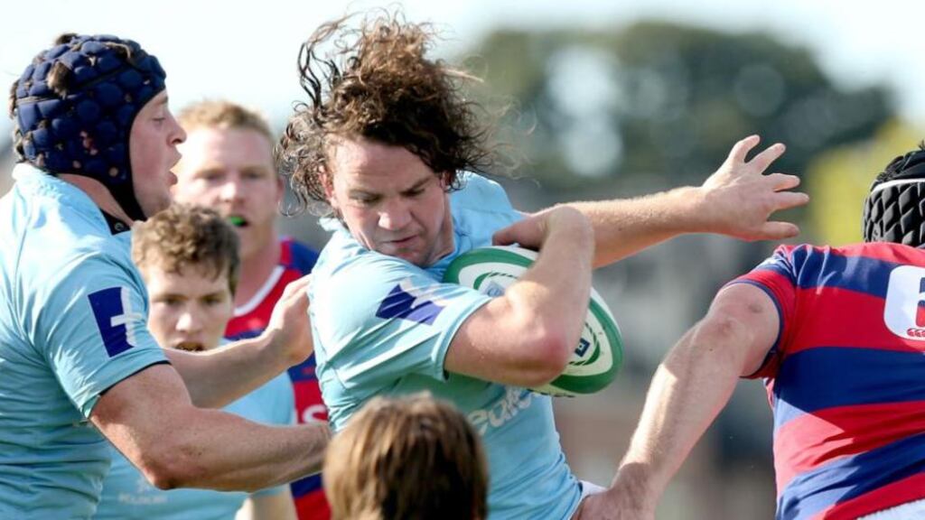 Garryowen’s Mark Hanrahan makes a break against Clontarf during the Ulster Bank League Division 1A clash at Castle Avenue, Dublin on Saturday. Photo: James Crombie/Inpho