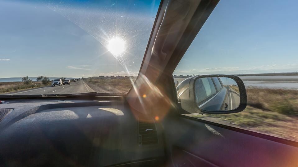 The back and side windows in cars tend to be made of non-laminated glass, which does not always block out UVA rays.