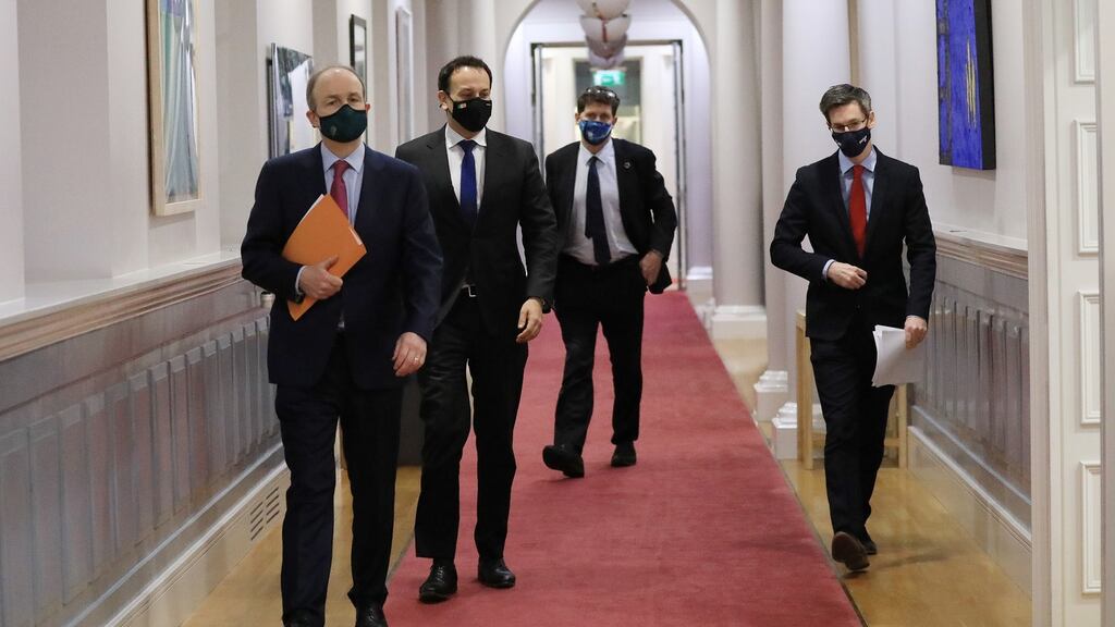 Government losing opinion poll support: Taoiseach Micheál Martin with Tánaiste Leo Varadkar, Minister for the Environment and Transport Eamon Ryan, and Dr Ronan Glynn, Deputy Chief Medical Officer, at Government Buildings.