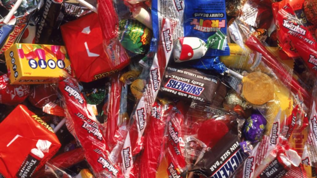 Halloween bounty: 45 chocolate bars, 10 packets of chocolate buttons, 17 packets of jellies . . . Photograph: Getty