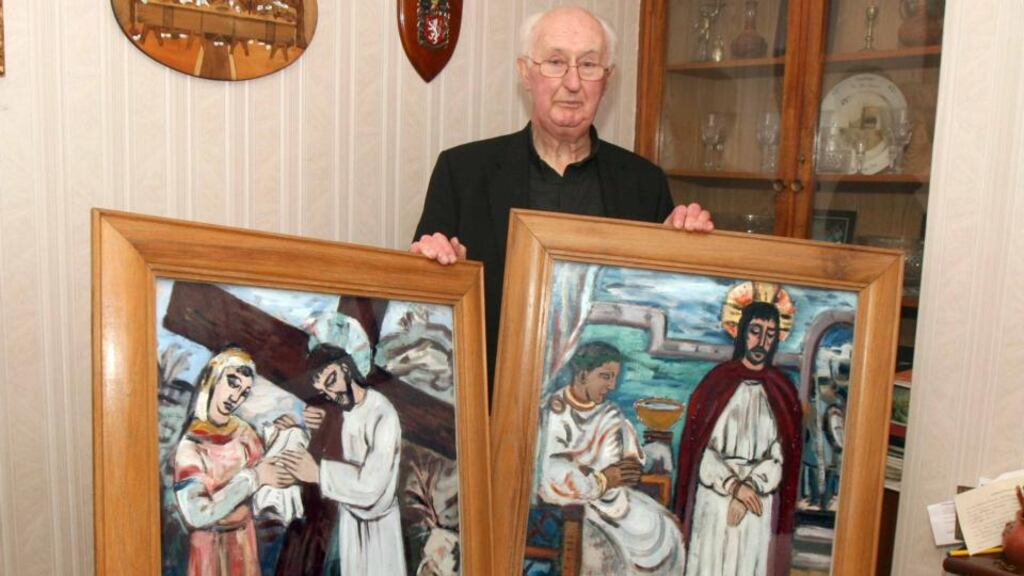 Fr Martin McNamara with two of Evie Hone’s paintings of the stations of the cross in Ss Peter and Paul church in Kiltullagh, Co Galway. Photograph: Hany Marzouk
