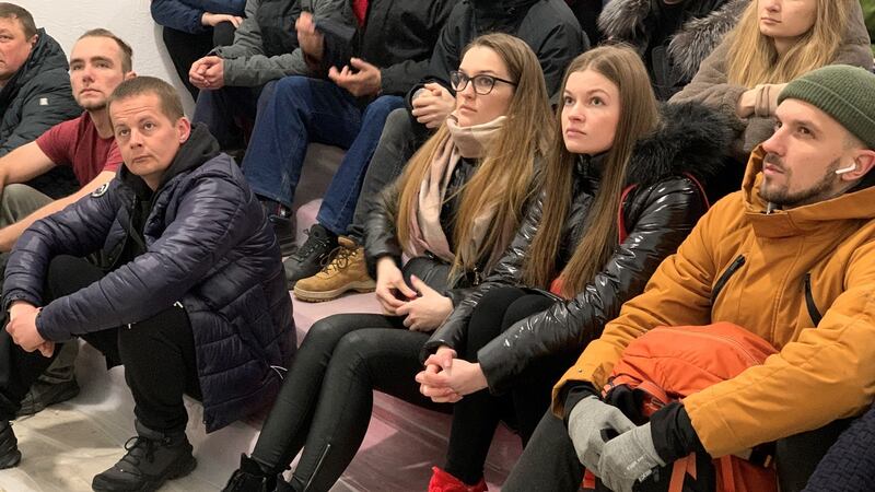 Nail artist Solomiya Ilechko and her close friend, pharmacist Mariana Oliynyk (centre), listen to instructions on the employment of Kalashnikovs and hand grenades. Photograph: Lara Marlowe