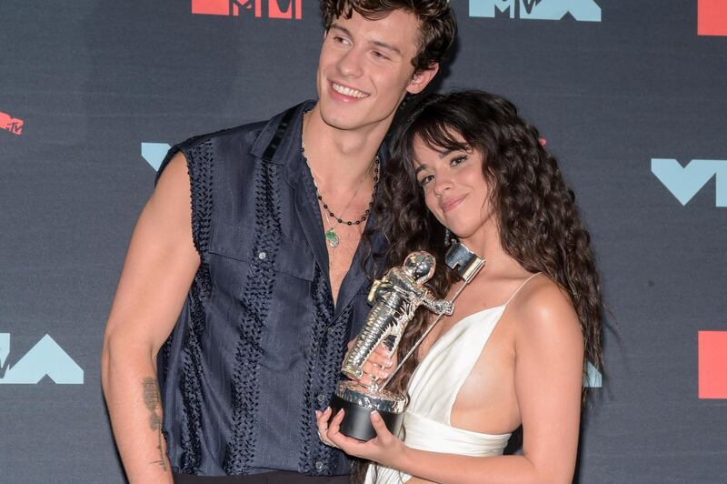Shawn Mendes and Camila Cabello pose with the Best Collaboration Award in the press room at the awards. Photograph: DJ Johnson/EPA