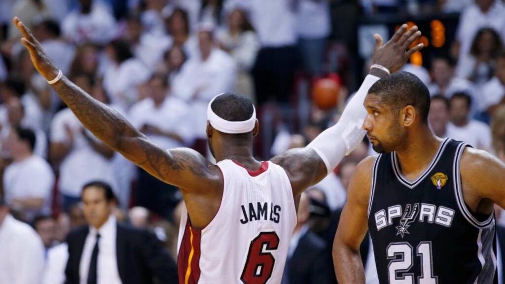 Miami Heat’s LeBron James reacts as San Antonio Spurs’ Tim Duncan looks on in the fourth quarter of Game 7 of their NBA Finals in Miami. Photograph: Mike Segar/Reuters