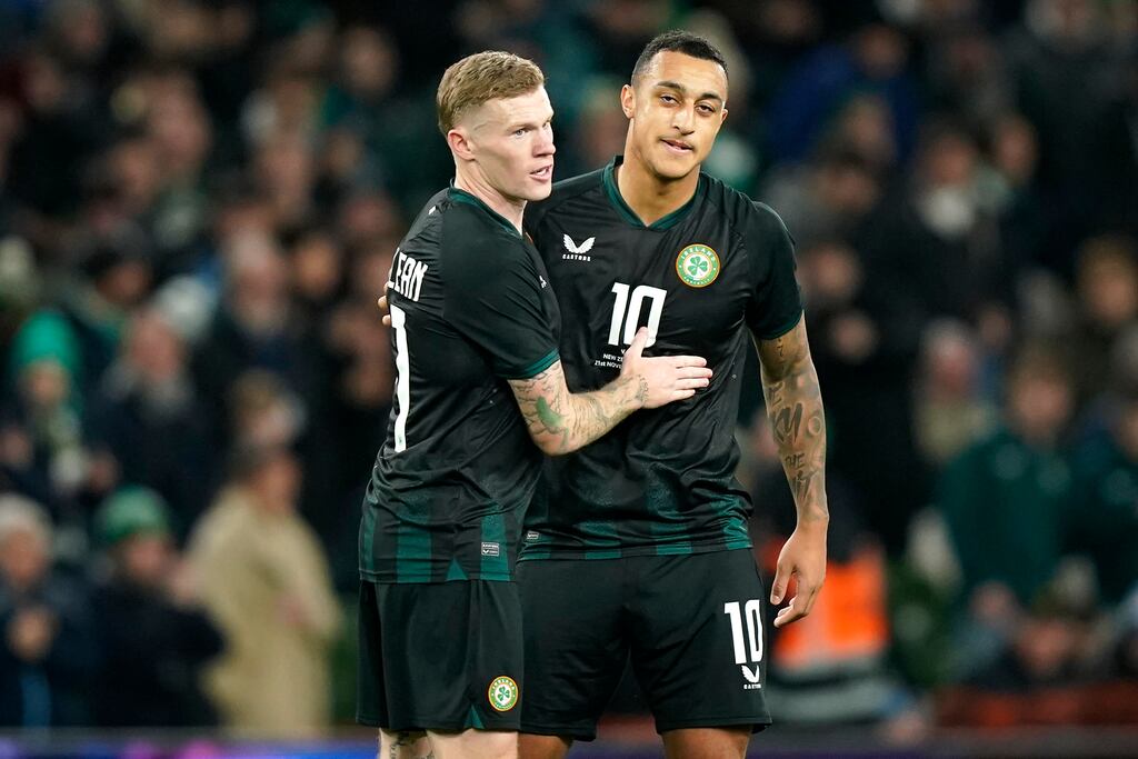 Republic of Ireland's Adam Idah celebrates scoring with team-mate James McClean. Photograph: Niall Carson/PA Wire