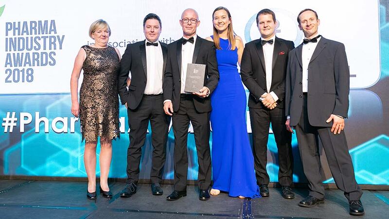 Michael Wood, Sales Director, Bioquell presents the Research & Development Achievement Award to the Almac Group team.