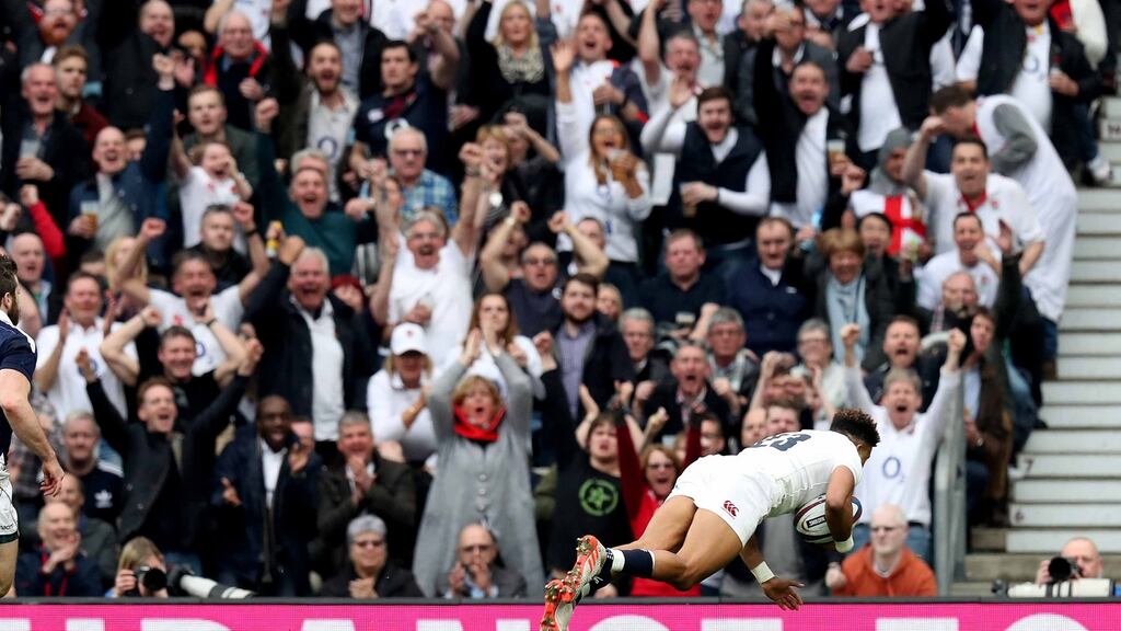 England’s Anthony Watson scores a try for England against Scotland at Twickenham. Photograph: Billy Stickland/Inpho