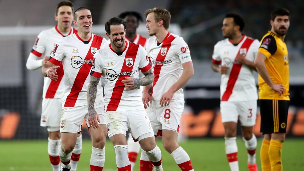 Southampton’s Danny Ings celebrates with his teammates after scoring their side’s first goal of the game during the FA Cup fifth round win over Wolves at Molineux. Photo: Nick Potts/PA Wire