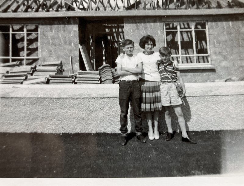 Philip Stephens with his  mother Teresa and brother Paul in Kiltimagh as one of the first bungalows in the Mayo town was being built in the 1960s