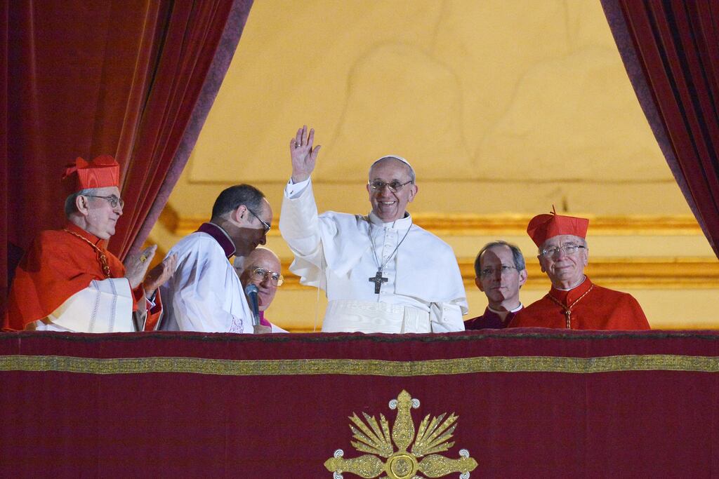 Argentina's Jorge Bergoglio after he was elected Pope Francis I waving from the window of St Peter's Basilica's balcony. Photograph: Vincenzo Pinto/Getty