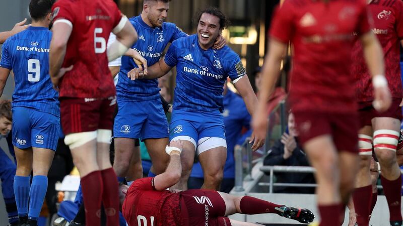 Leinster’s James Lowe is congratulated by Ross Byrne after scoring a try against Munster. Ireland require the same functionality he showed in that game tomorrow. Photograph: Billy Stickland/Inpho